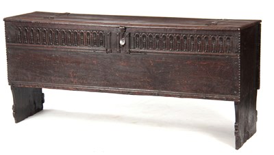 Lot 695 - A 17TH CENTURY OAK PLANK COFFER / SWORD BOX OF...