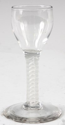 Lot 12 - AN 18TH CENTURY WINE GLASS with ogee bowl and...