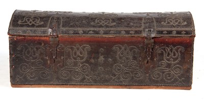 Lot 729 - A 17TH CENTURY BRASS STUDDED LEATHER BOUND...