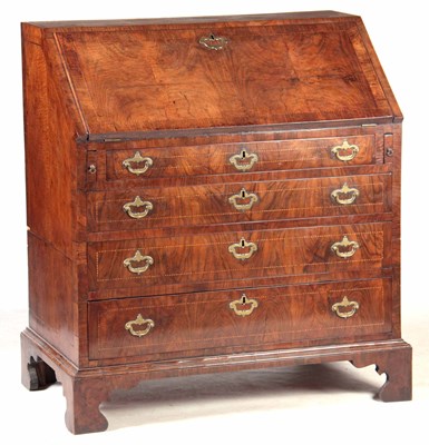 Lot 752 - A QUEEN ANNE FIGURED WALNUT BUREAU with...