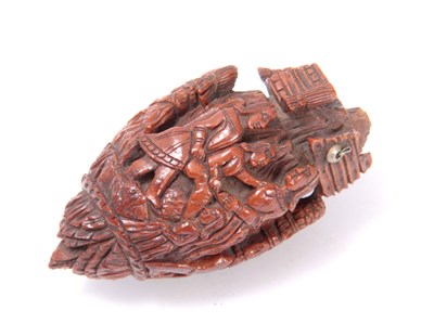 Lot 306 - A REGENCY CARVED COQUILLA NUT PRISONER OF WAR...