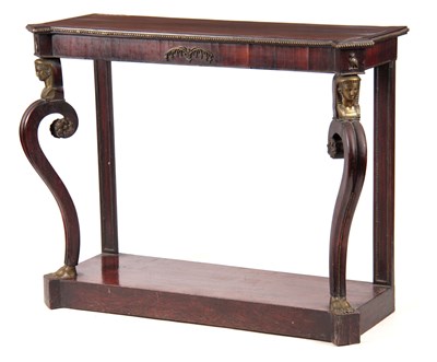 Lot 657 - A FINE REGENCY BRASS INLAID CONSOLE TABLE IN...