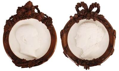 Lot 611 - A NEAR PAIR OF CARVED WHITE MARBLE CIRCULAR...