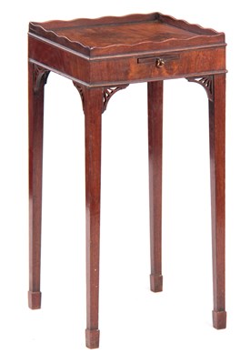 Lot 668 - A GEORGE III CHIPPENDALE FLAMED MAHOGANY...