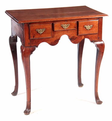 Lot 756 - AN UNUSUAL SOLID WALNUT EARLY 18TH CENTURY...