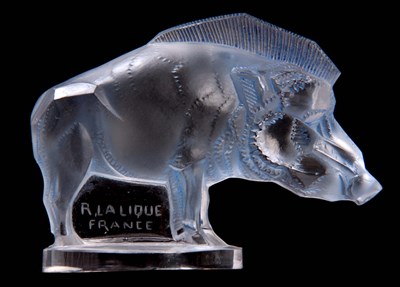 Lot 20 - R LALIQUE A CLEAR AND BLUE STAINED BOAR...