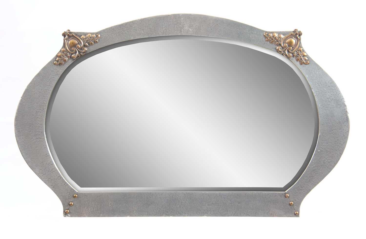 Lot 393 - AN ARTS AND CRAFTS HAMMERED PEWTER WALL MIRROR...