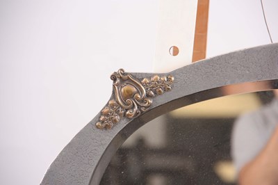 Lot 393 - AN ARTS AND CRAFTS HAMMERED PEWTER WALL MIRROR...
