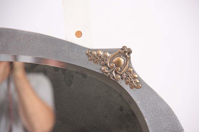 Lot 393 - AN ARTS AND CRAFTS HAMMERED PEWTER WALL MIRROR...