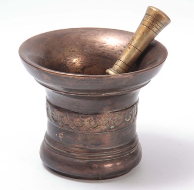 Lot 398 - A 17TH CENTURY LARGE BRONZE MORTAR AND PESTLE...