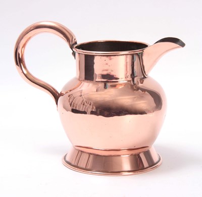 Lot 380 - A LATE GEORGIAN COPPER ALE JUG of seamed...