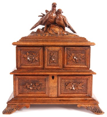 Lot 629 - A late 19th Century Black Forest type Walnut...