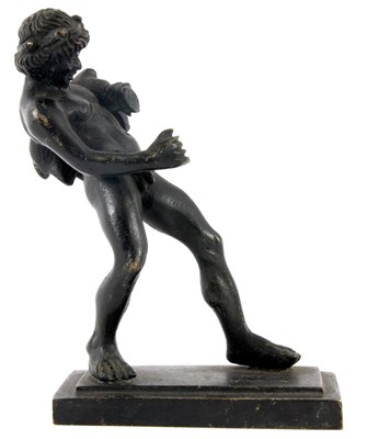 Lot 617 - AN EARLY CAST BRONZE OF AN RECLINING NAKED...