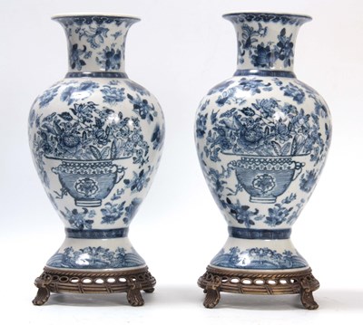 Lot 97 - A PAIR OF ORIENTAL BLUE AND WHITE BALUSTER...