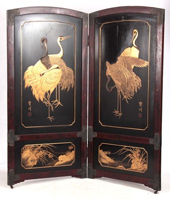 Lot 134 - A 19TH CENTURY JAPANESE LACQUERED SCREEN with...