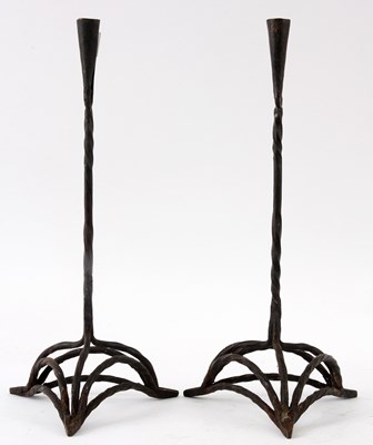 Lot 455 - AN EARLY PAIR OF WROUGHT IRON TAPER STICKS of...