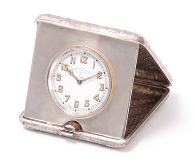 Lot 185 - AN EARLY 20th CENTURY SILVER CASED TRAVEL...