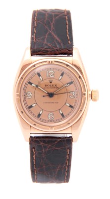 Lot 180 - A 14CT ROSE GOLD ROLEX 'BUBBLEBACK' WRISTWATCH...