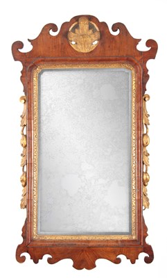 Lot 1032 - A GEORGE II WALNUT HANGING MIRROR with shaped...