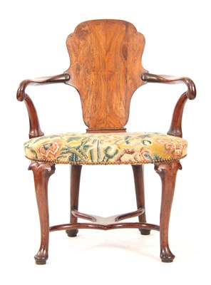 Lot 1033 - A GEORGE I WALNUT OPEN ARMCHAIR with solid...