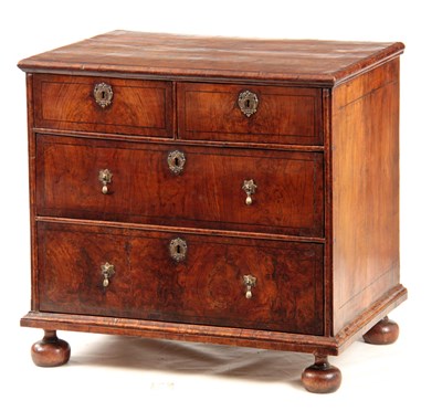 Lot 1034 - A WILLIAM AND MARY FIGURED WALNUT CHEST OF...