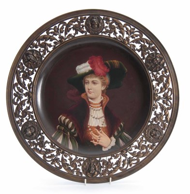 Lot 104 - A 19THCENTURY CONTINENTAL PORCELAIN PORTRAIT...