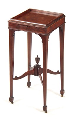 Lot 1045 - A GEORGE III FIGURED MAHOGANY KETTLESTAND the...