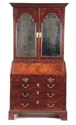 Lot 1083 - A WILLIAM AND MARY BURR WALNUT BUREAU BOOKCASE...