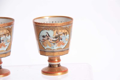 Lot 147 - A JAPANESE KUTANI WARE FOOTED SAKI CUPS with...