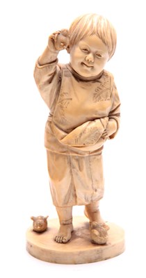 Lot 194 - A JAPANESE MEIJI PERIOD CARVED IVORY OKIMONO...