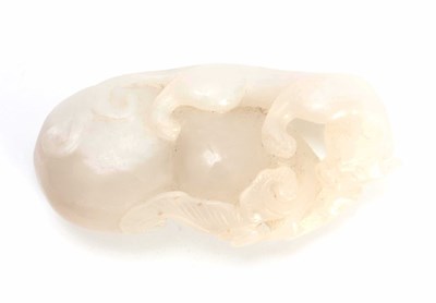 Lot 199 - A CHINESE CARVED WHITE JADE SCULPTURE...