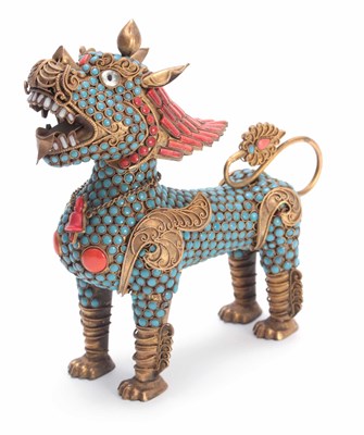 Lot 207 - AN ORIENTAL GILT BRASS BUDHISTIC DRAGON LION...