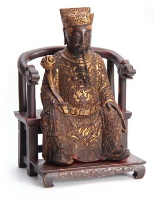 Lot 216 - A 19TH CENTURY ORIENTAL SEATED CARVED WOOD...