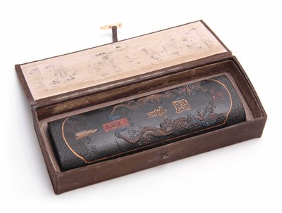 Lot 219 - A 19TH CENTURY CHINESE INK BLOCK of flattened...