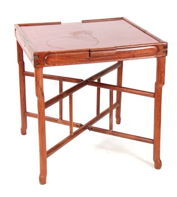 Lot 231 - A 19TH CENTURY CHINESE HARDWOOD GAMES TABLE...