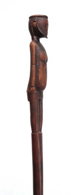 Lot 285 - AN AFRICAN CARVED HARDWOOD WALKING CANE the...