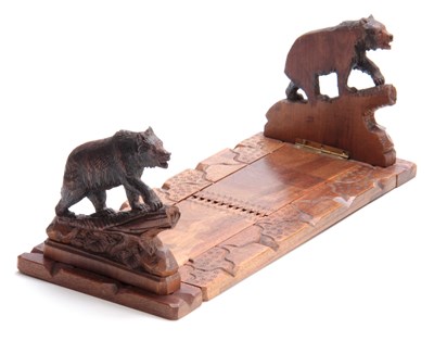 Lot 376 - A LATE 19TH CENTURY SWISS BLACK FOREST CARVED...