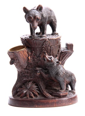 Lot 378 - A LATE 19TH CENTURY SWISS CARVED BEAR TOBACCO...