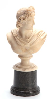 Lot 399 - A ROMAN MARBLE BUST finely carved, mounted on...