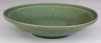 Lot 133 - A LARGE CHINESE 18TH CENTURY CELADON SHALLOW...