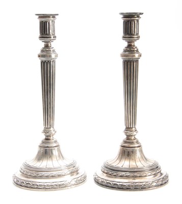 Lot 568 - A PAIR OF GERMAN SILVER CANDLESTICKS having...