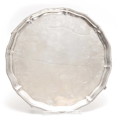 Lot 573 - A LARGE LATE 19th CENTURY SILVER SALVER with...