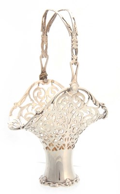 Lot 590 - AN ATTRACTIVE SILVER PIERCED BASKET with swing...