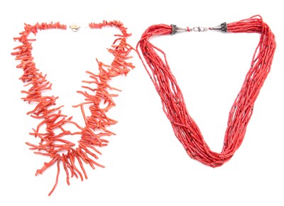 Lot 655 - TWO CORAL NECKLACES, 52cm and 56cm overall.