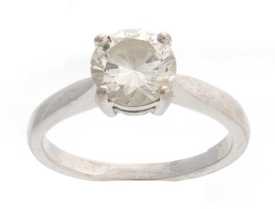 Lot 659 - A .750 WHITE GOLD SQUARE CLAW SET SOLITAIRE...