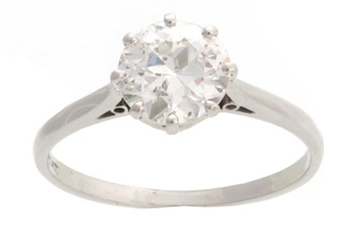 Lot 660 - A PLATINUM CLAW SET SOLITAIRE DIAMOND RING...