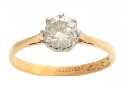 Lot 662 - A YELLOW GOLD AND PLATINUM CLAW SET SOLITAIRE...