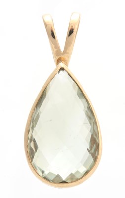 Lot 675 - A YELLOW GOLD MOUNTED TEARDROP SHAPED PENDANT...