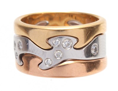 Lot 699 - AN 18CT GOLD INTERLOCKING RING BY GEORGE...