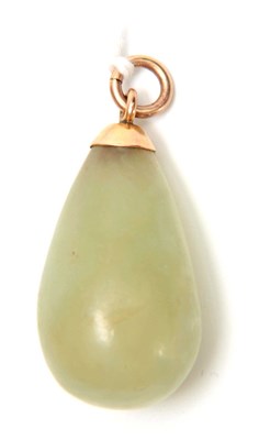 Lot 708 - A LARGE JADE PENDANT with yellow Gold mount...